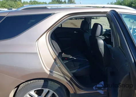 2018 Chevrolet Equinox Premier z USA, uszkodzony, nr VIN 2GNAXWEX9J6196335